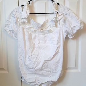 Perfect white top to go with anything - the possibilities are endless.